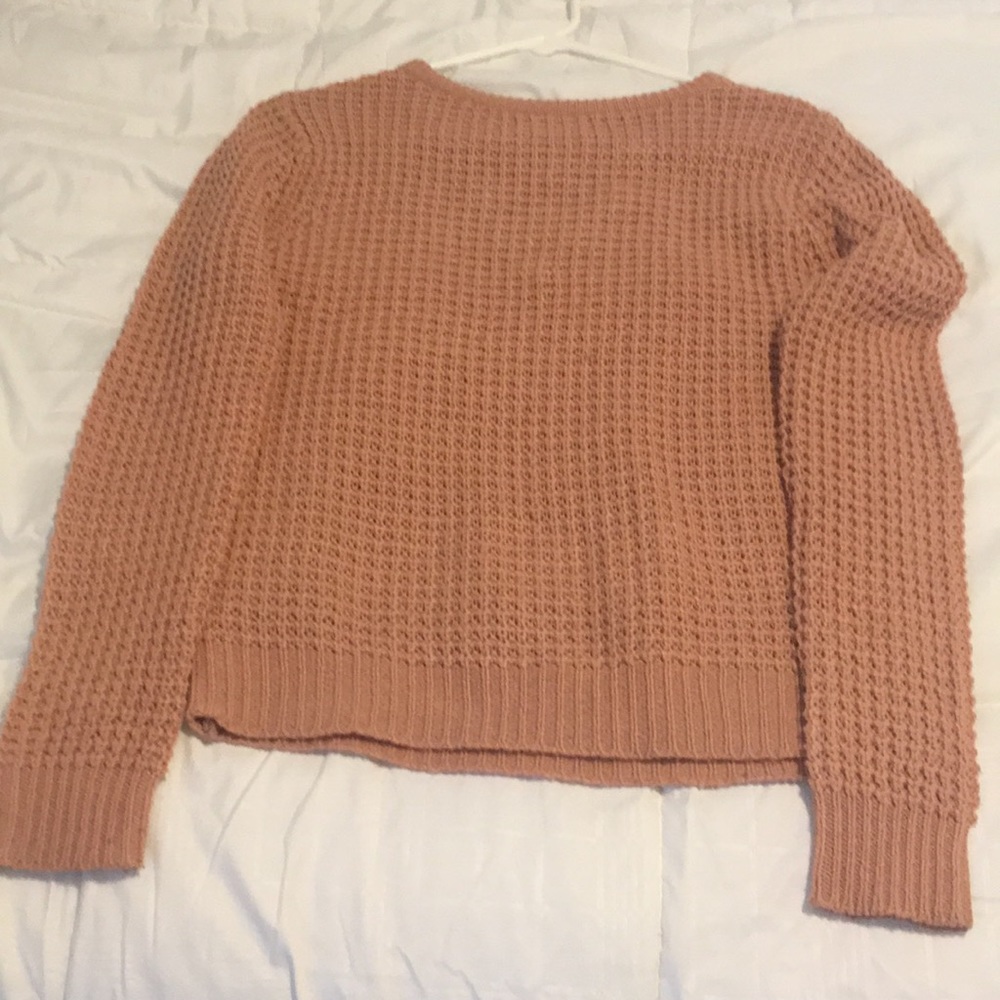 Pink sweater with crossed back